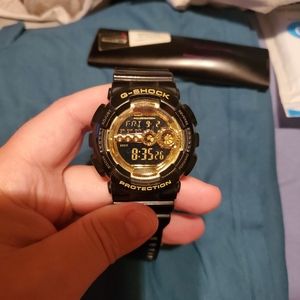 Casio Black and gold G-Shock watch
